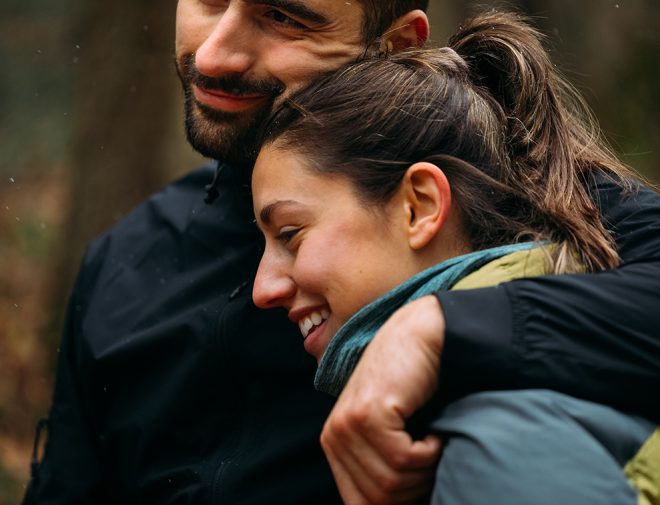 Woman and man hugging