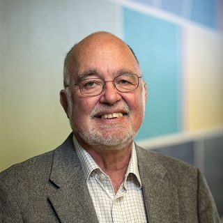 Headshot photograph of Whit Jones